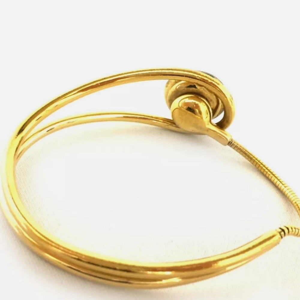 LOUIS VUITTON CELESTE MAGNET GOLD TONE BRACELET - Picture 6 of 16